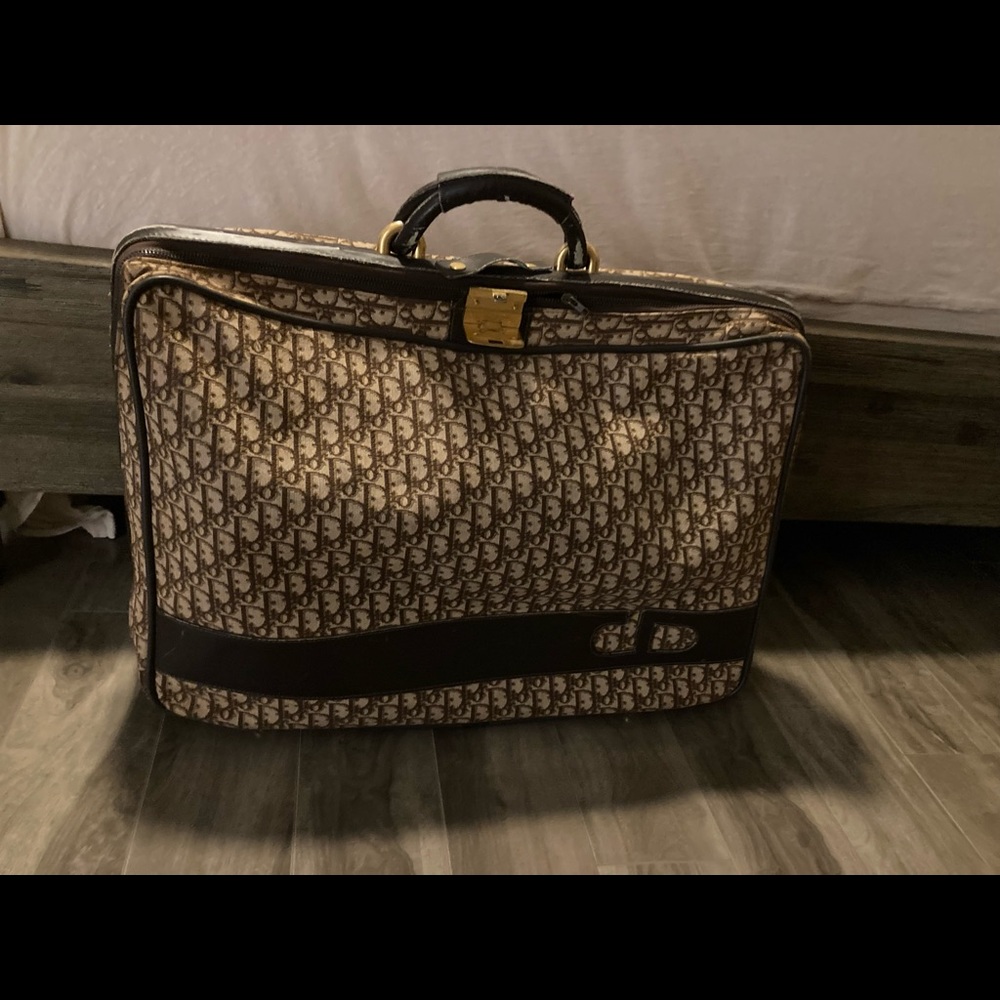 Christian Dior vintage suitcase. 24” x18”. Clean.Bit of wear top leather corners